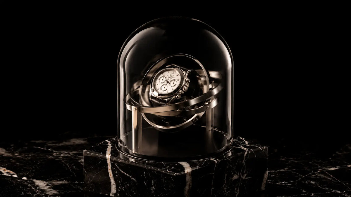 Orbital Watch Winder inside a glass, timeless piece of Brummell Winders. 