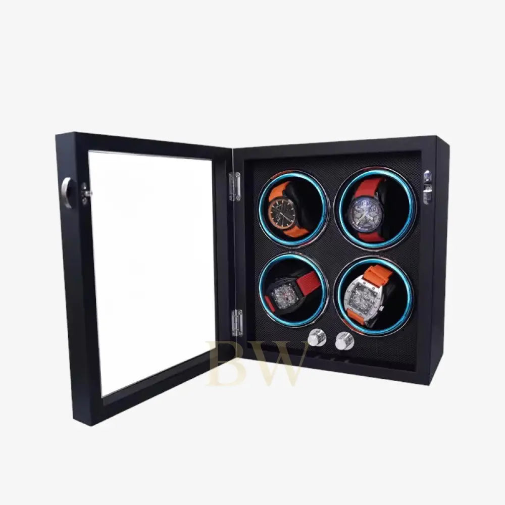 Black watch display case with four watches inside on a white background