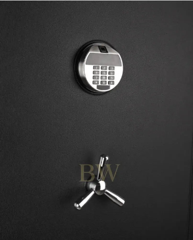 Black safe with digital keypad and traditional lock on a black background
