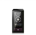 Watch winder with two watches inside on a white background, branded 'Miron Atelier'.