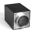 Black and silver cylindrical device with carbon fiber texture on a white background