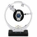 Audemars Piguet Royal Oak on a luxury watch winder stand with a white background