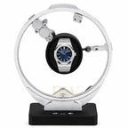 Audemars Piguet Royal Oak on a luxury watch winder stand with a white background