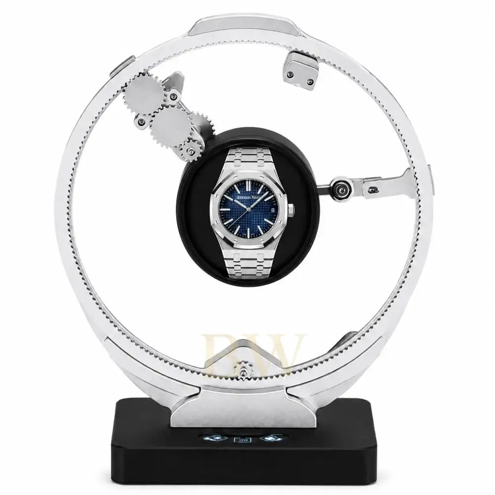 Audemars Piguet Royal Oak on a luxury watch winder stand with a white background