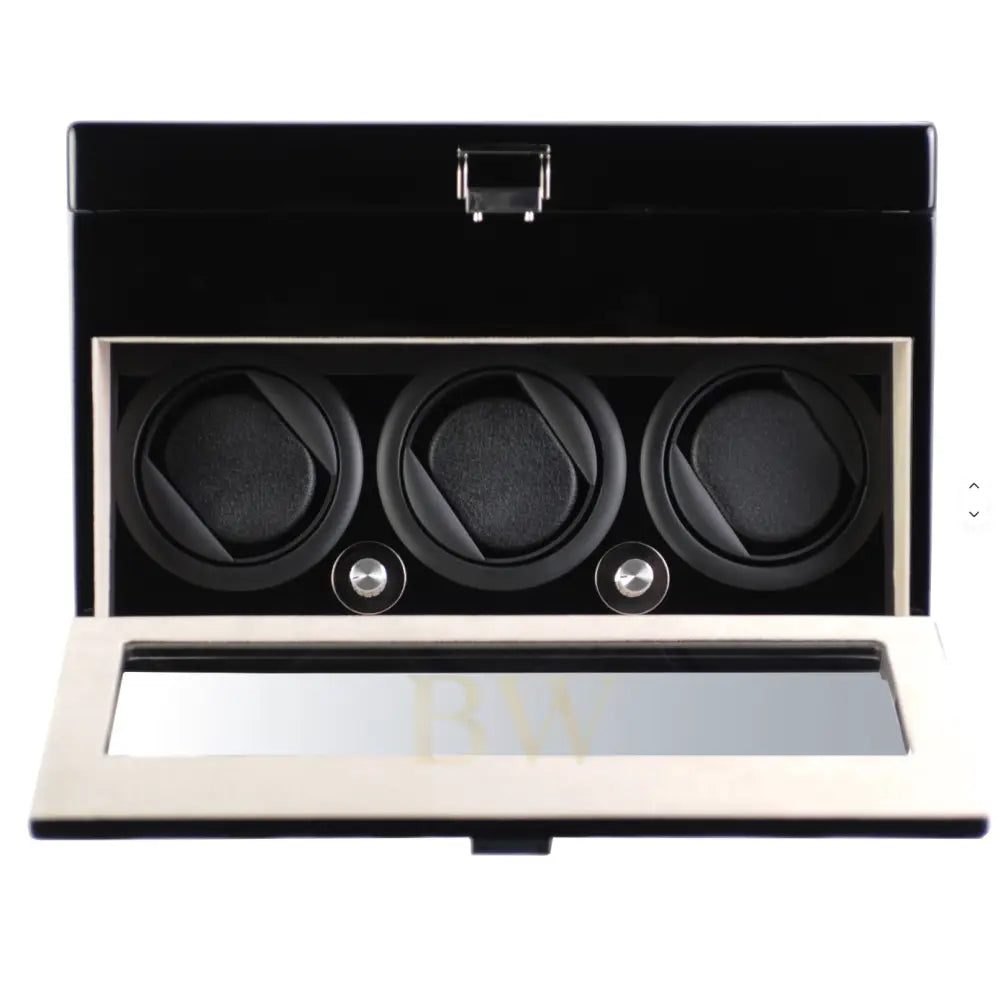 Black watch winder with three compartments on a white background