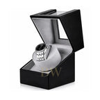 Luxury Watch in a black watch winder box and grey velour on a white background