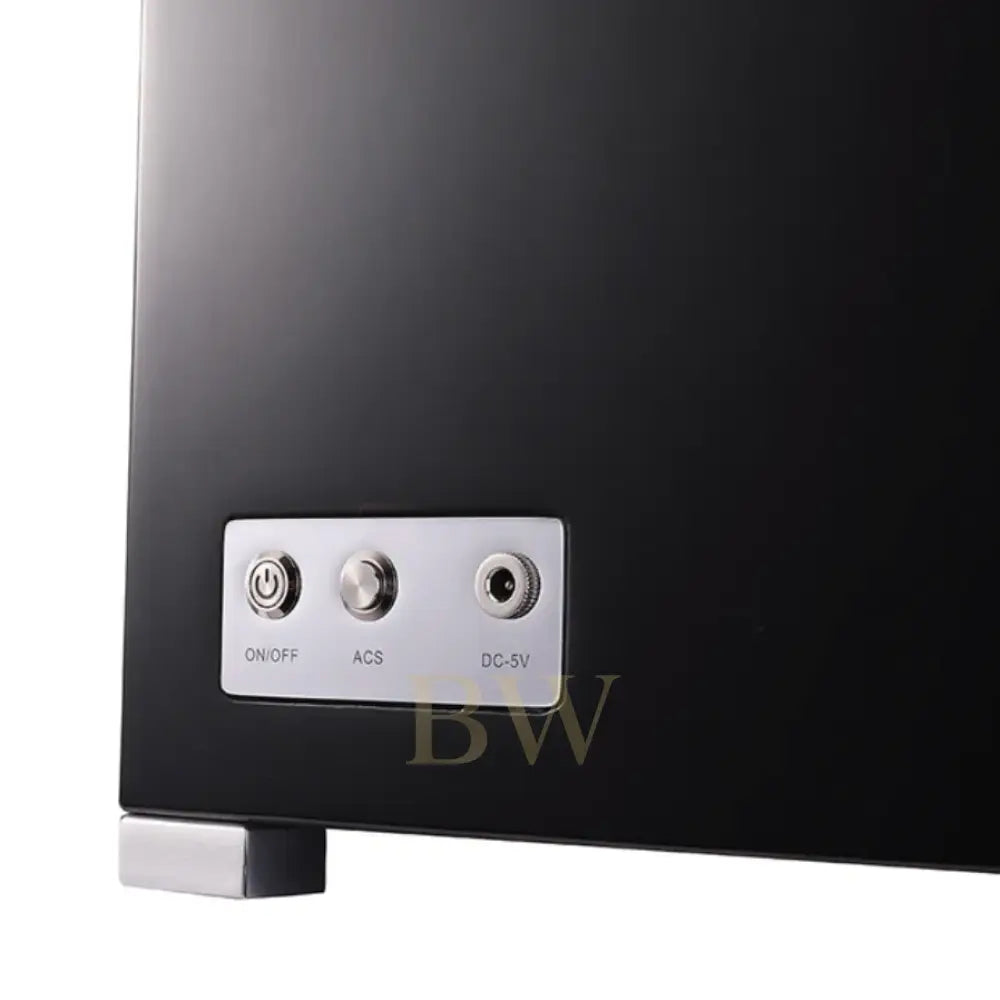 Control panel with power, ACS, and DC-5V ports on a black watch winder device.