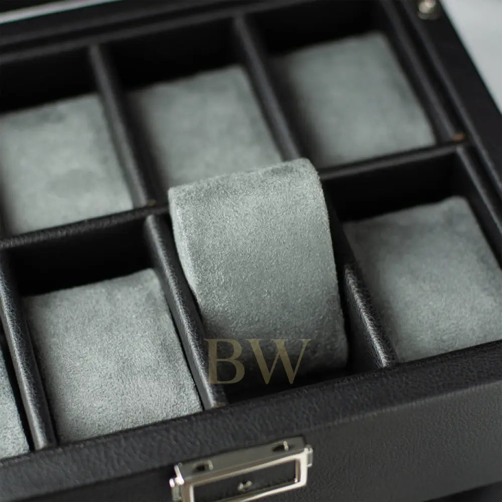 Gray ring on gray felt in a black jewelry box