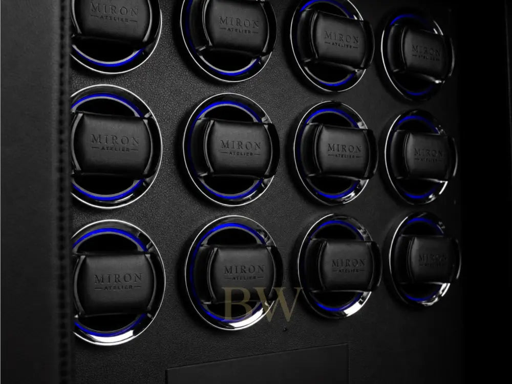 Black and blue rotators for luxury watches branded with 'Miron' branding