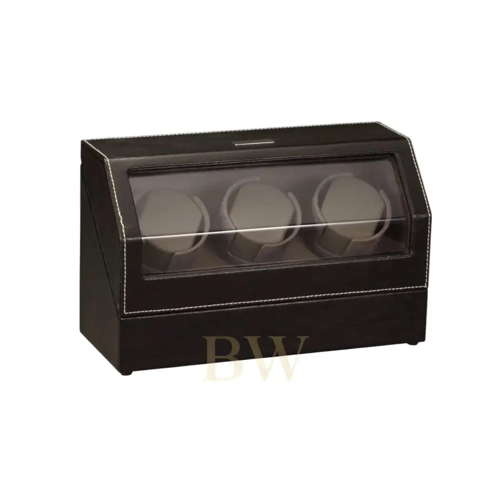 Black watch winder with three watch cases on a white background