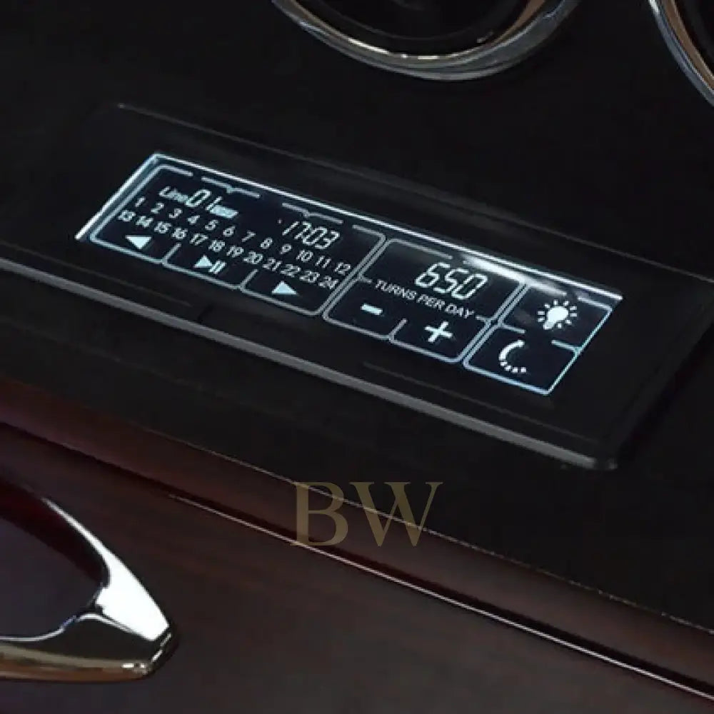 Digital display on a piece of electronic watch winder equipment with control buttons.