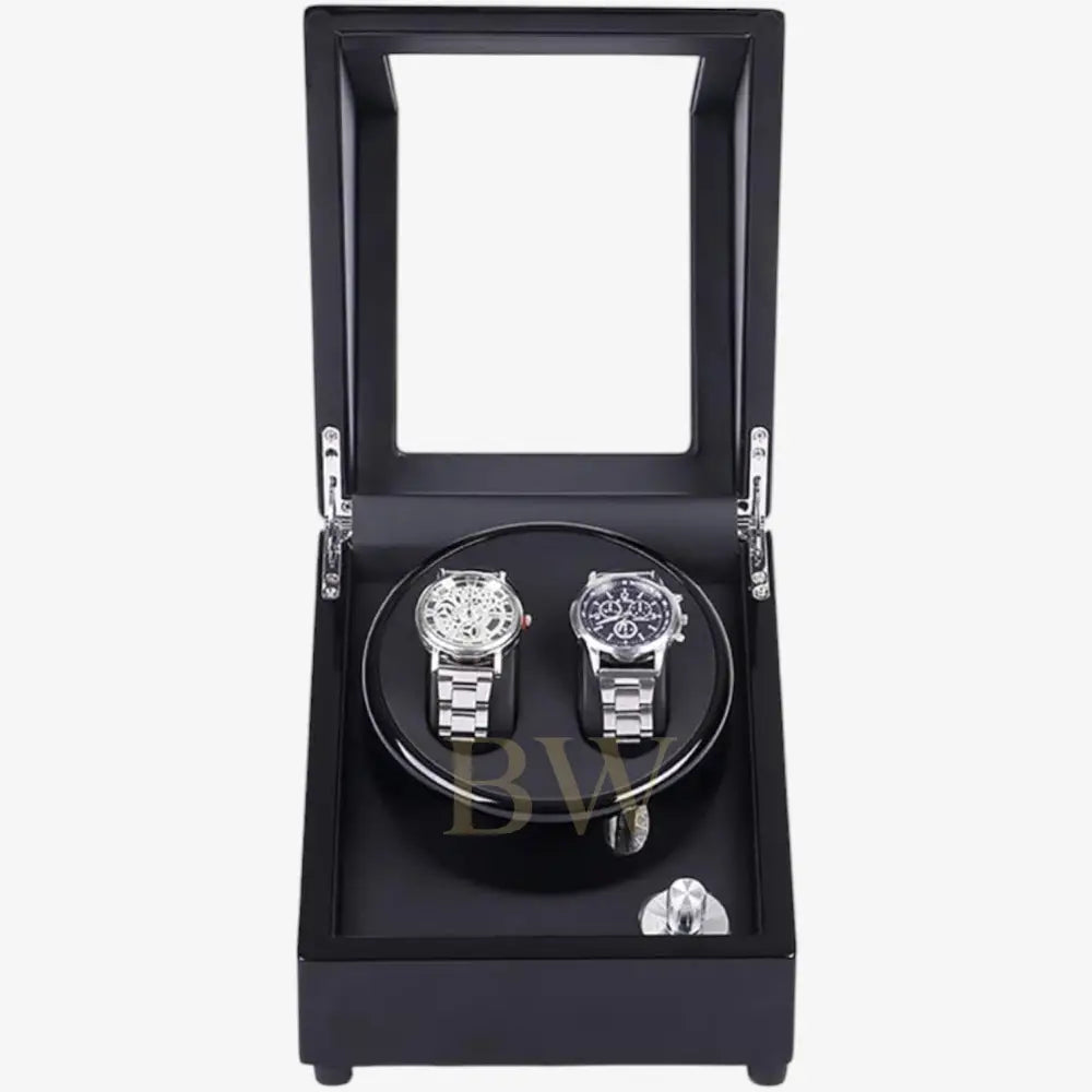 Black watch winder with two watches inside on a white background
