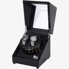 Black watch winder with two watches inside on a white background