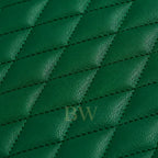 Close-up of the green rolex leather