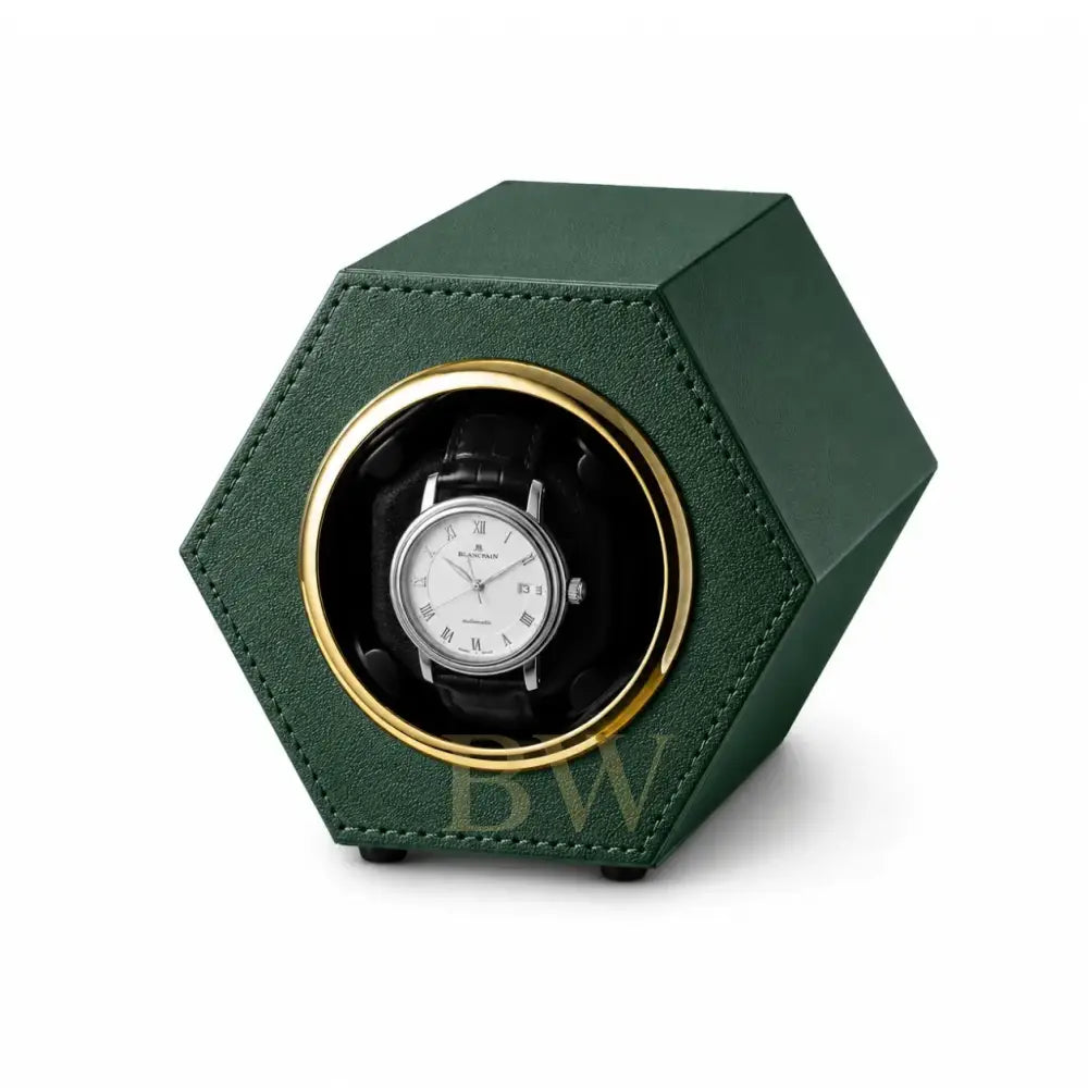 Hexagonal green watch winder with a automatic watch inside