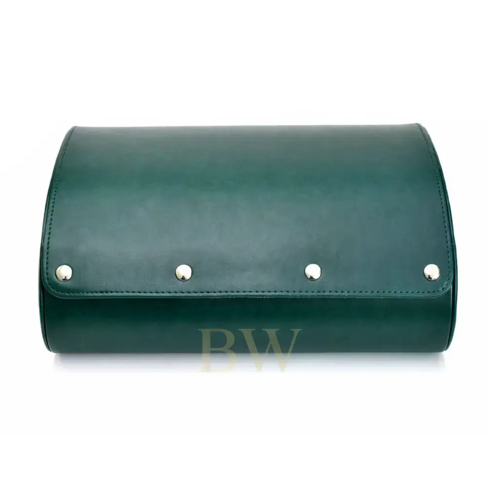 A dark green leather watch roll with a curved top, featuring four silver metal studs along the front flap, set against a plain white background.