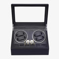 Black watch winder box with two rotating compartments on a white background