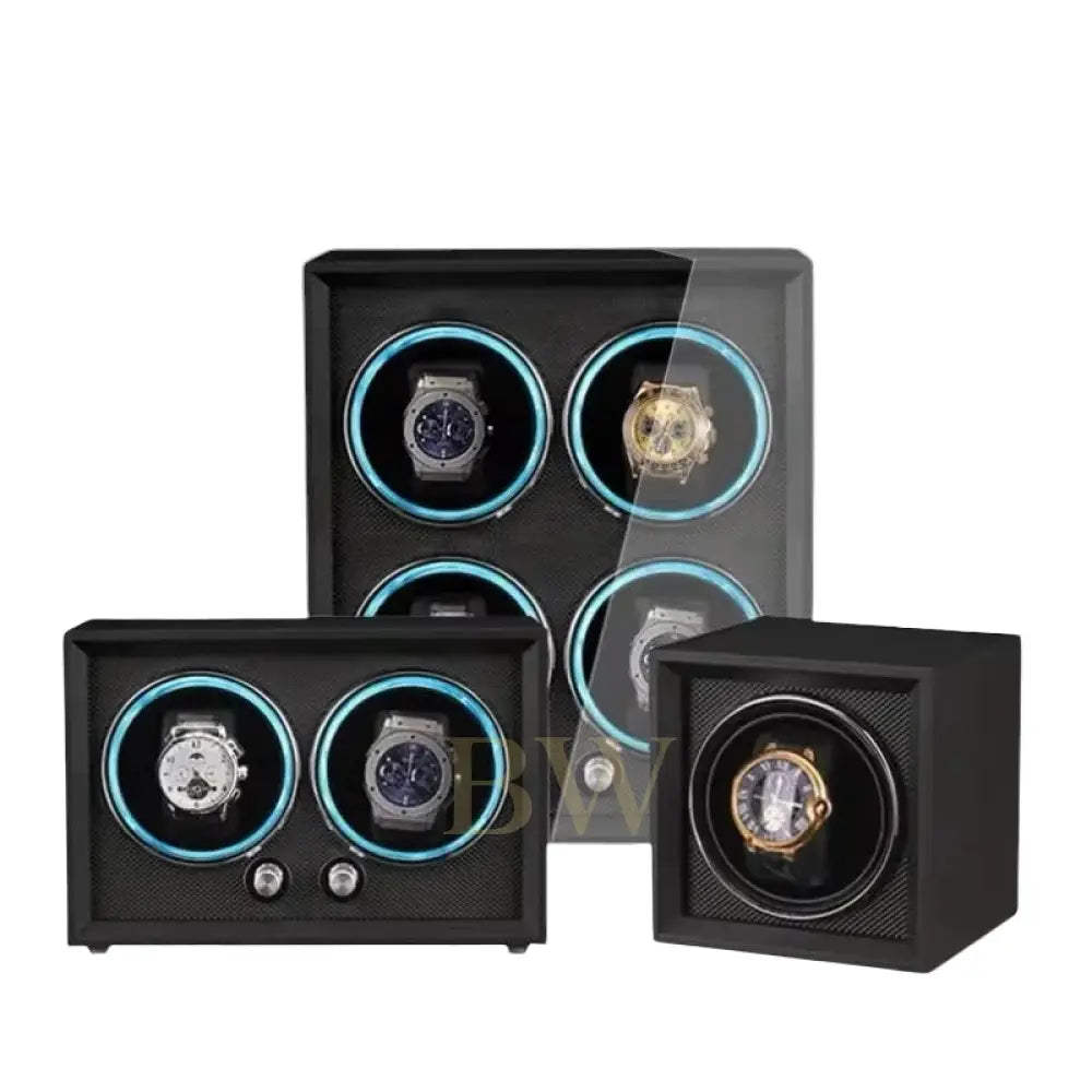Set of luxury watch winders with watches inside on a white background