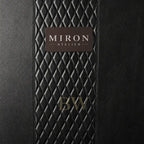 Black textured surface with a 'Miron Atelier' label