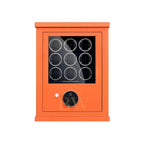 Orange finition watch winder with nine watches inside on a white background