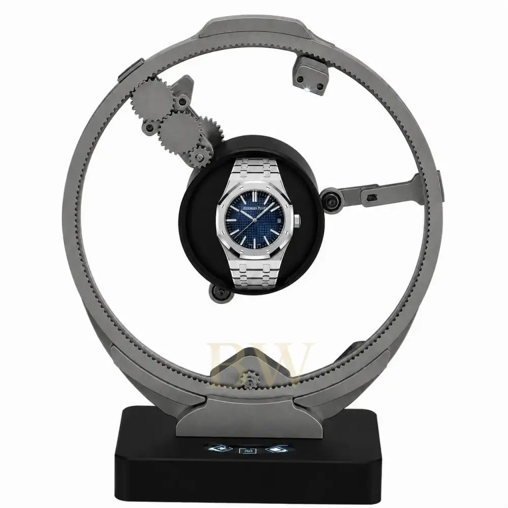 Audemars Piguet on a rotating luxury watch winder stand with a white background