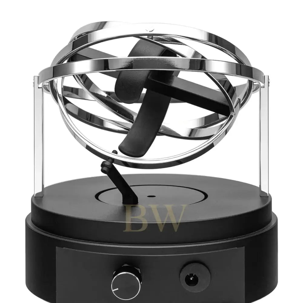 Black and silver magnetic levitation orb for watch winder on a white background