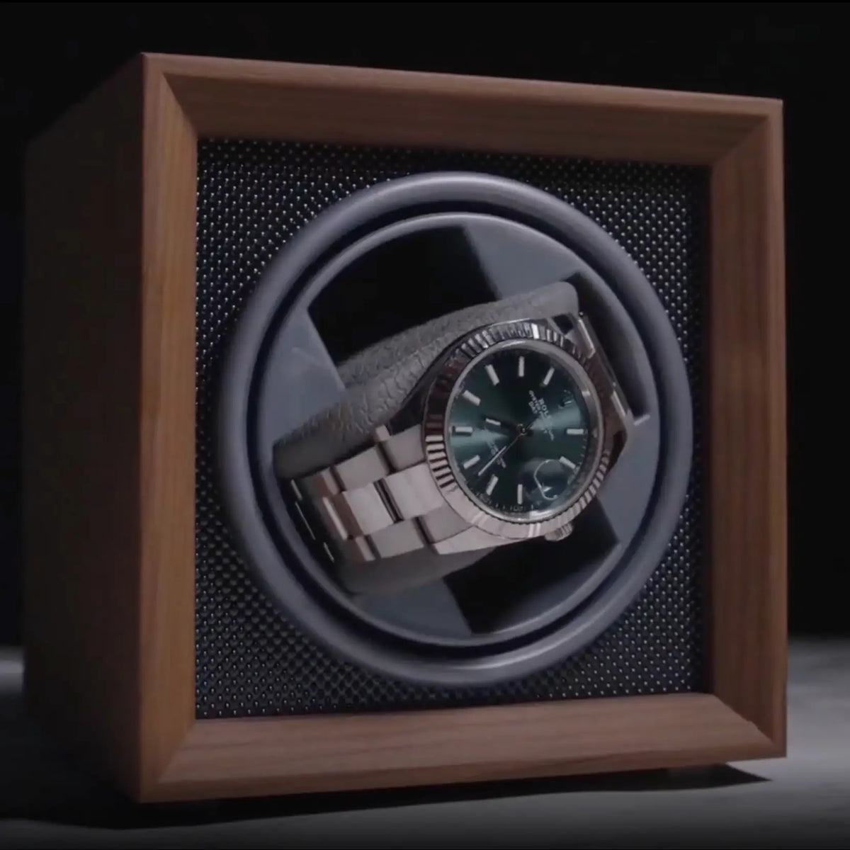 Rolex Watch on a Luxury Wood Watch Winder