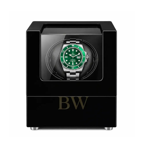 Rolex Watch Winder with a black case on a white background