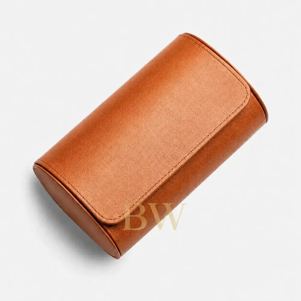 A warm brown leather watch roll