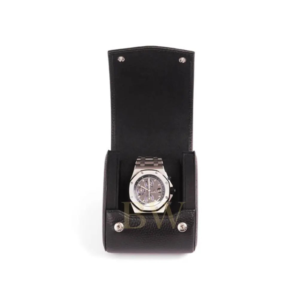Silver watch in a black leather display case on a white background