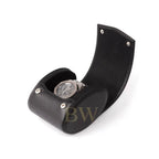 Black leather watch case with a silver luxury watch on a white background