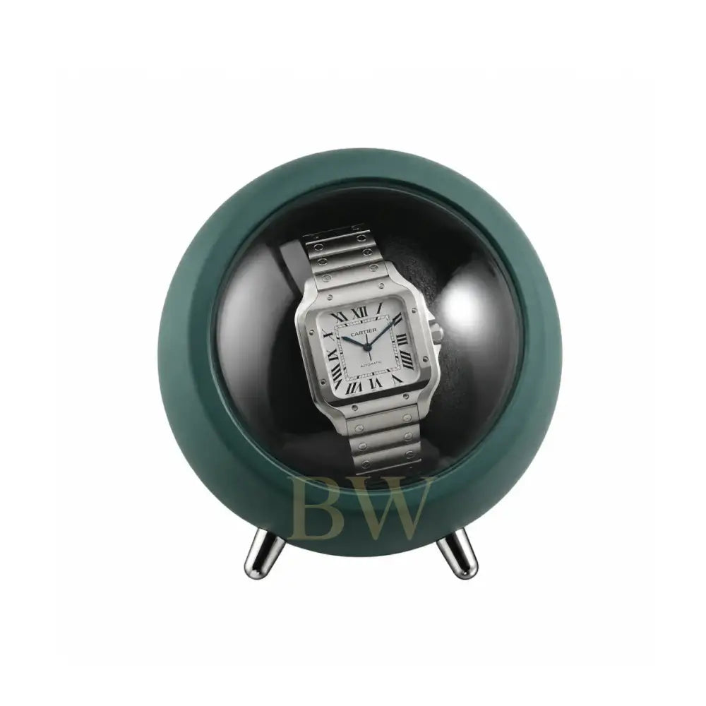 Silver Cartier Santos watch in a green watch winder