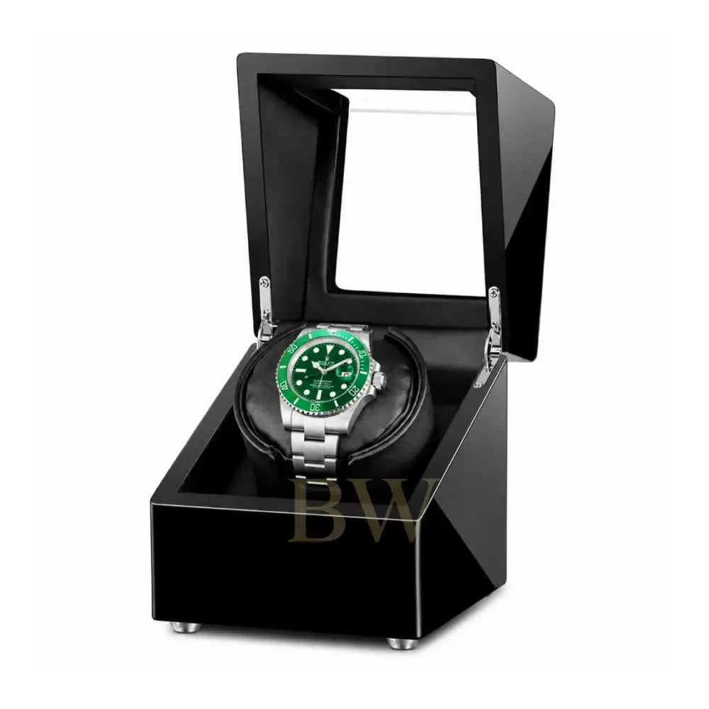 Rolex Watch in a luxury watch winder on a white background