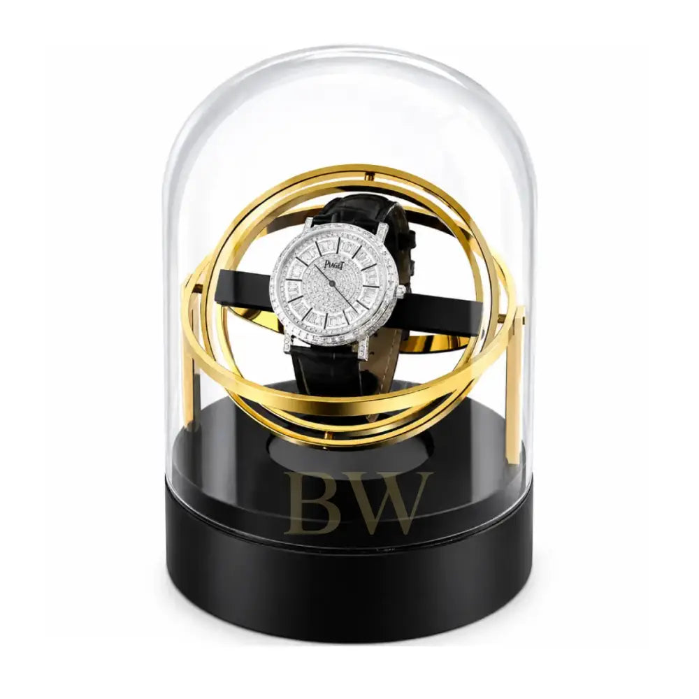 Luxury Watch under a glass dome with gold accents on a black base of a gyro watch winder