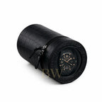 Black crocodile-patterned watch winder on a white background