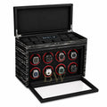 Black watch winder with multiple watches. For luxury watch collector.