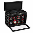 Black watch winder with multiple watches. For luxury watch collector.
