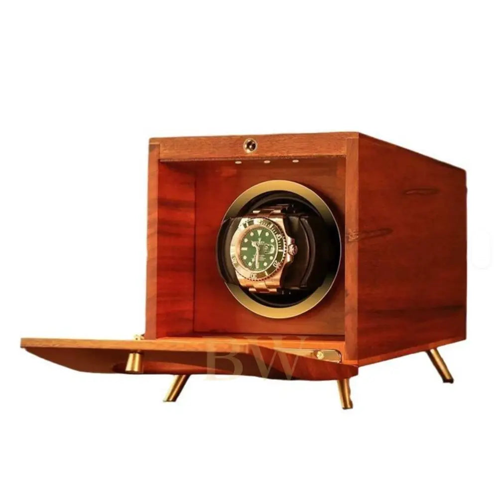 Wooden watch winder with a gold rolex watch inside on a white background