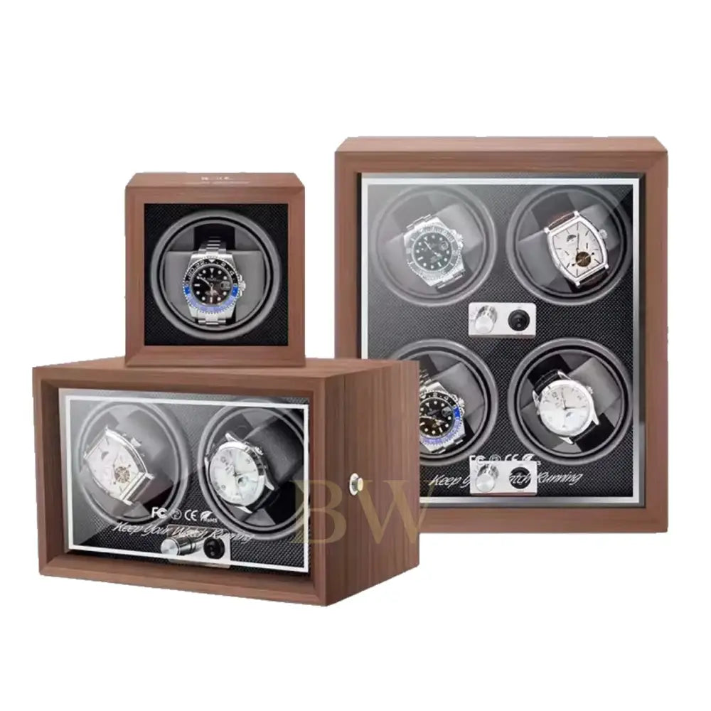 Wooden watch winders boxes with multiple watch faces displayed on a white background